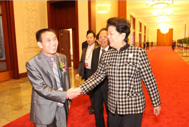 全国人大副委员长陈立志在人民大会堂接见李穆